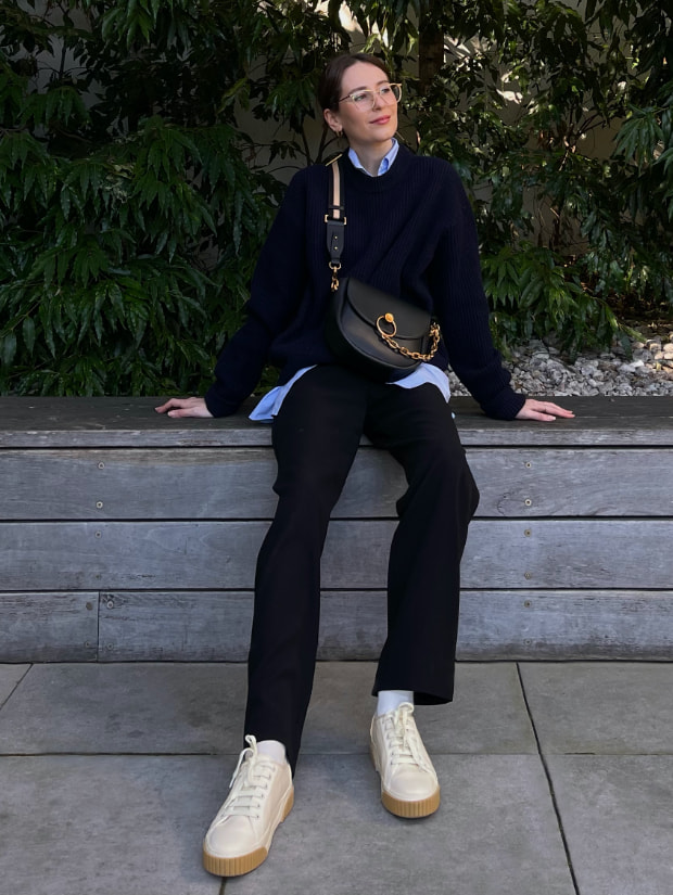 Women’s chunky chain-link saddle bag and recycled cotton low-top sneakers, as seen on Jess Alizzi - CHARLES & KEITH