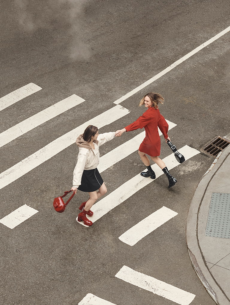 Lula Patent Chunky Heel Calf Boots in black; Lula Patent Block Heel Boots in red; Lula Patent Buckled Bag in black and red - CHARLES & KEITH