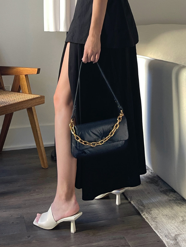 Women’s Zadie padded shoulder bag, asymmetric square toe mules in white and ankle strap derby shoes in black, as seen on Kristen Marie Nichols - CHARLES & KEITH