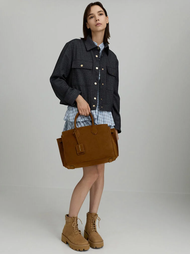 A suede tote paired with suede ankle boots brings a cosy but laid-back vibe. 