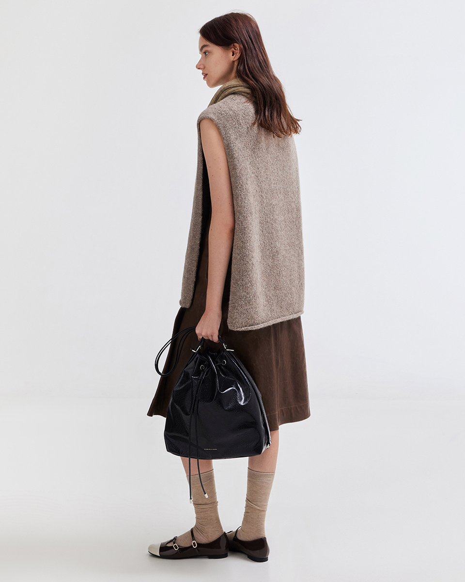 Women’s Neva two-way bucket bag in noir and double-strap T-bar Mary Janes  - CHARLES & KEITH