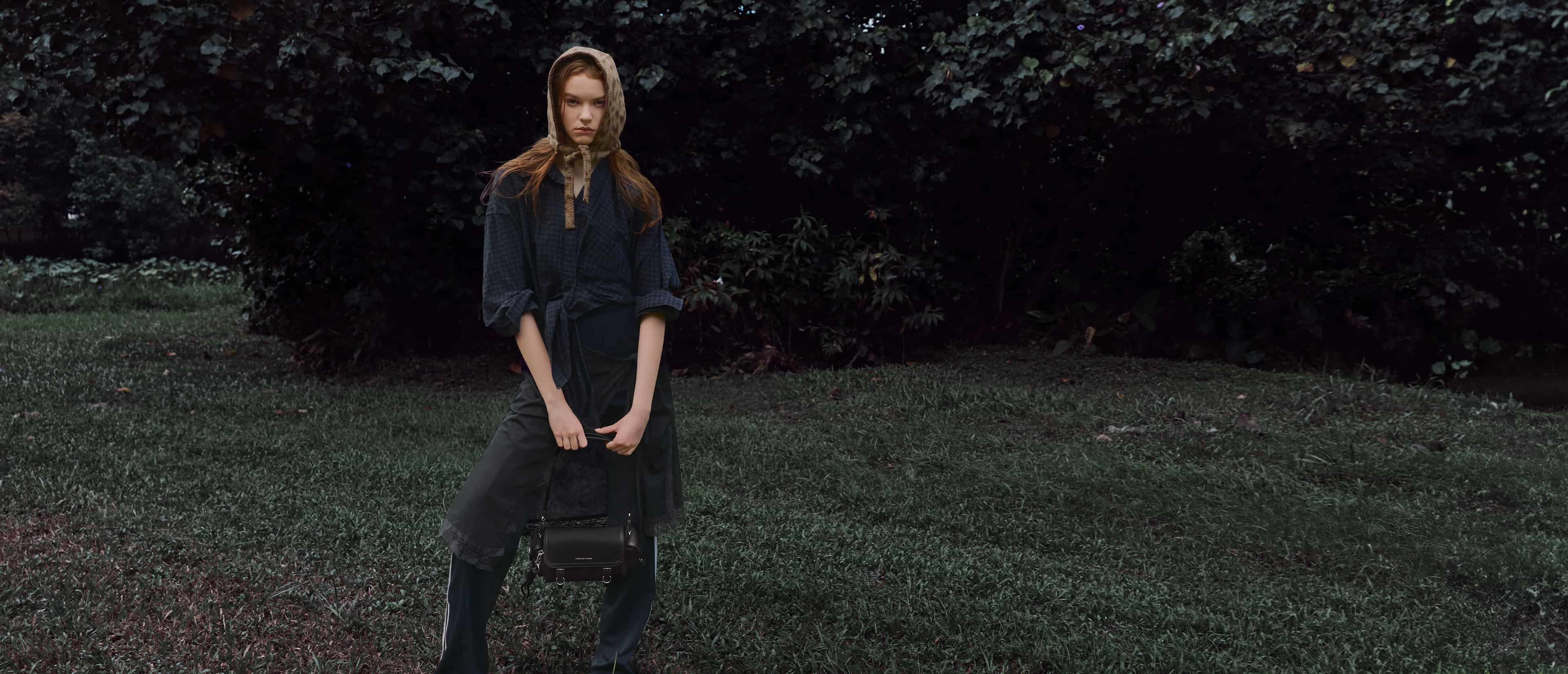 Women's Levy Nylon Buckled Crossbody Bag in noir - CHARLES & KEITH