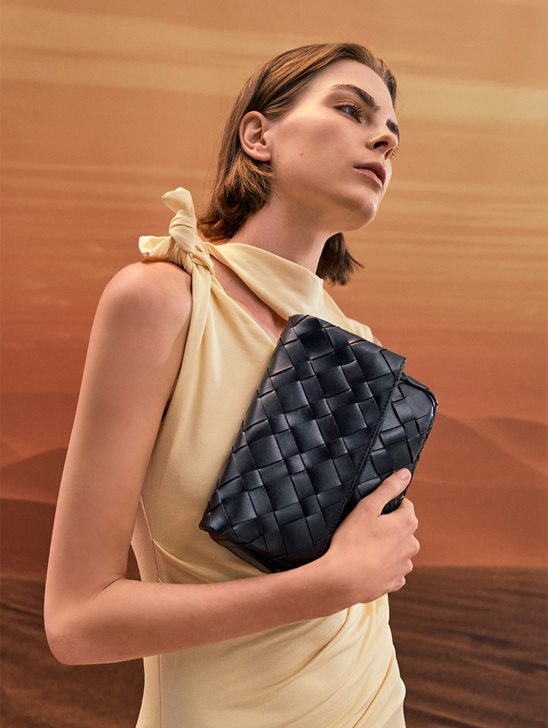 Women’s Ivette woven front flap crossbody bag in noir – CHARLES & KEITH