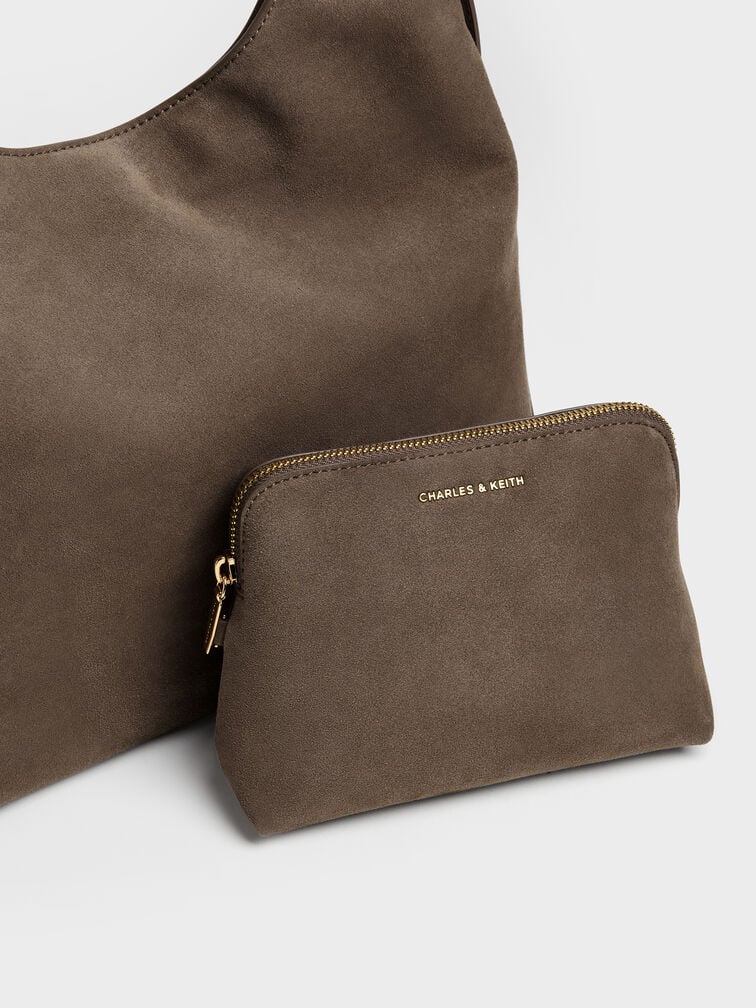 The Aislin hobo bag includes a removable interior pouch for organising smaller essentials.