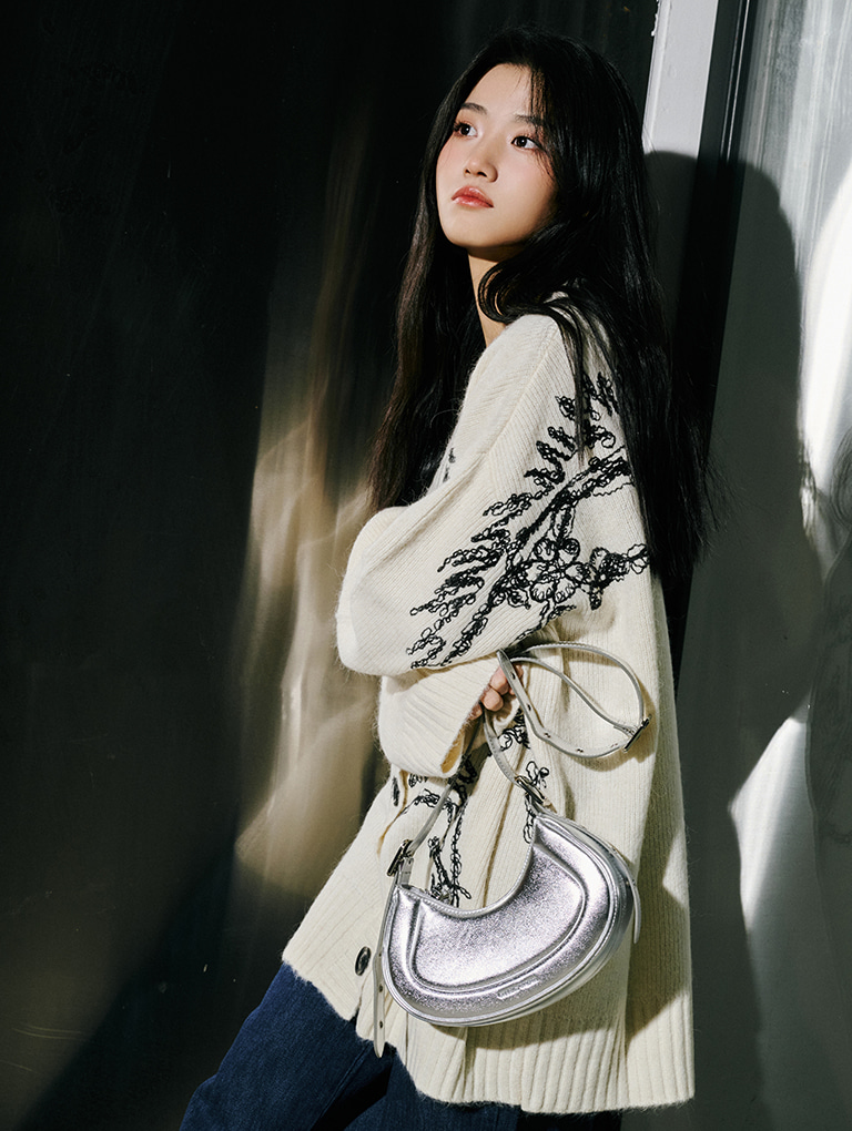 Women’s Petra curved shoulder bag in silver, as seen on Irene Lu Yu Xiao – CHARLES & KEITH