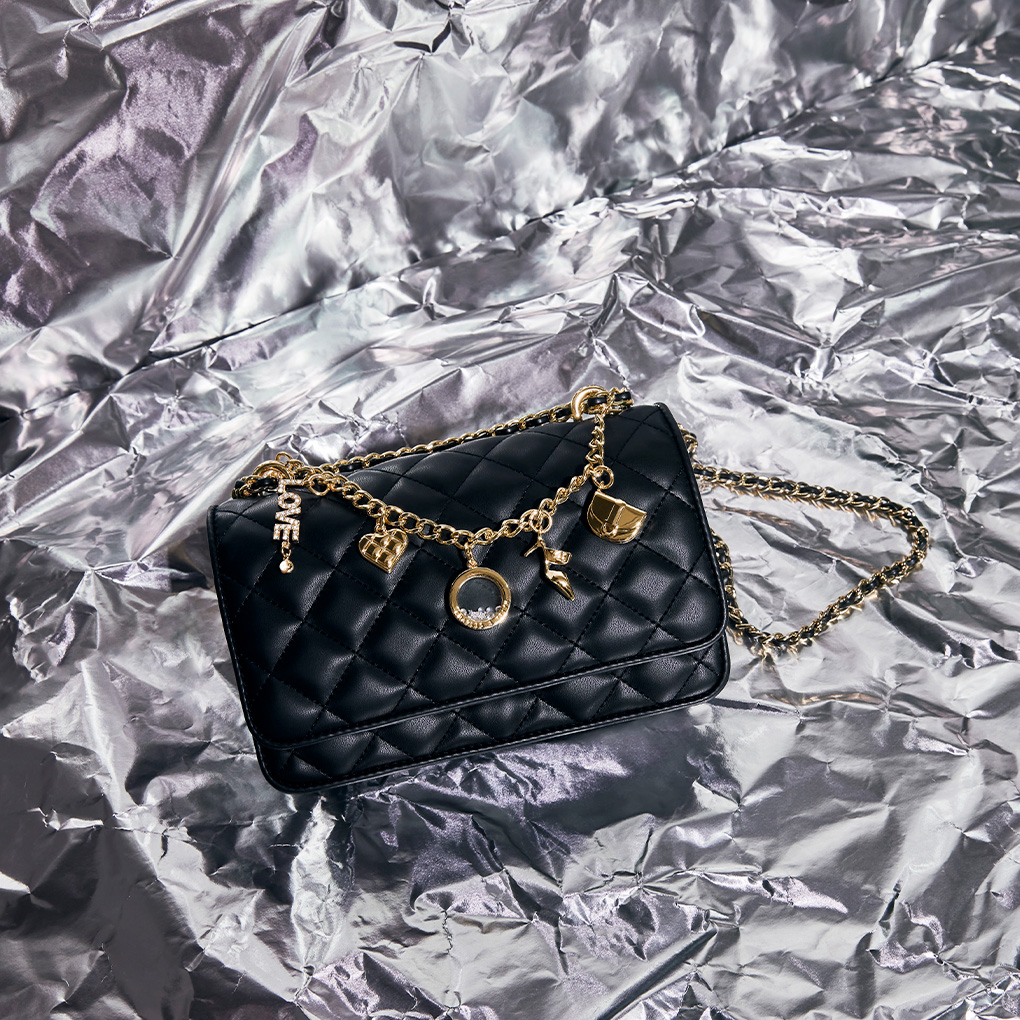 Women’s charm-embellished quilted clutch  - CHARLES & KEITH