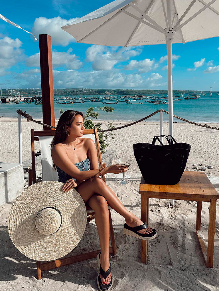 Women’s Ida knitted sculptural tote bag and espadrille thong sandals, as seen on Jasmine Nadiko - CHARLES & KEITH