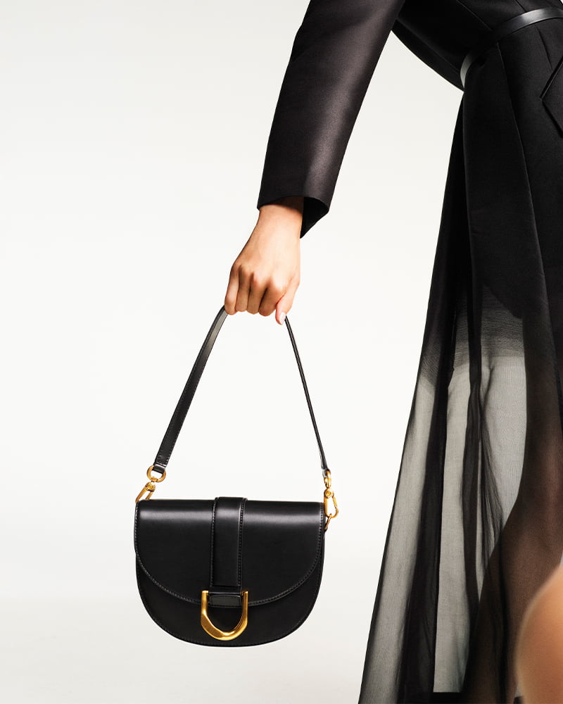 Women’s metallic buckle saddle bag in black – CHARLES & KEITH