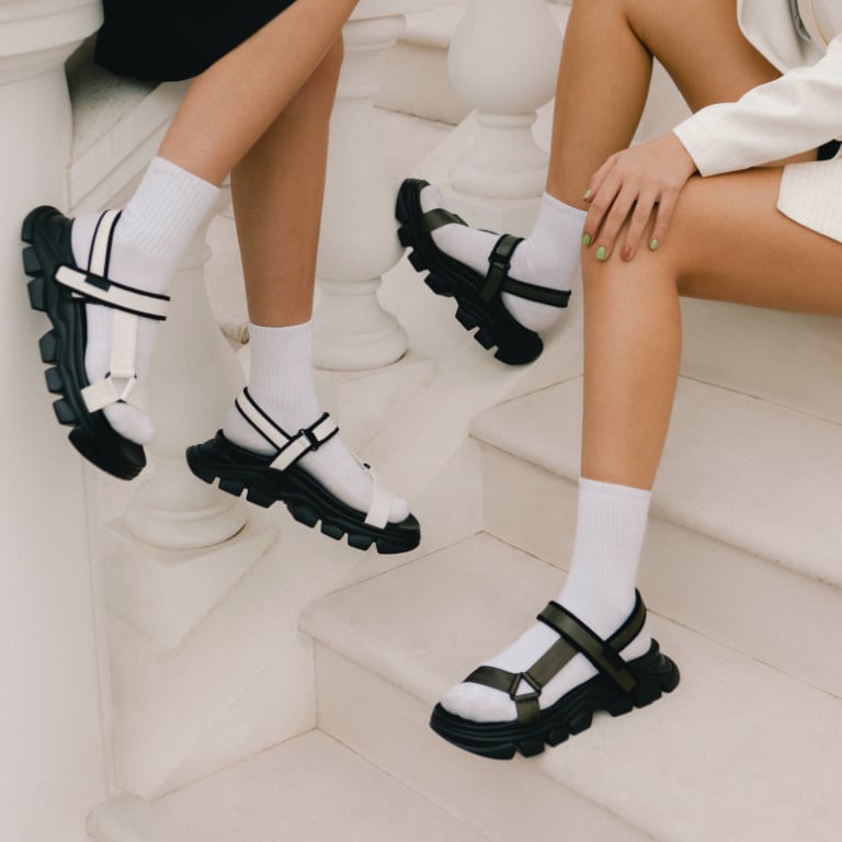 Women’s Grosgrain Sports Sandals in white and military green, as seen on Anna and Sonia Kuprienko (close up) - CHARLES & KEITH