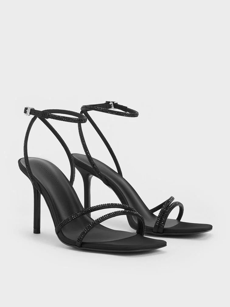 Satin crystal stiletto sandals in timeless black, a glamorous choice for festive dressing.