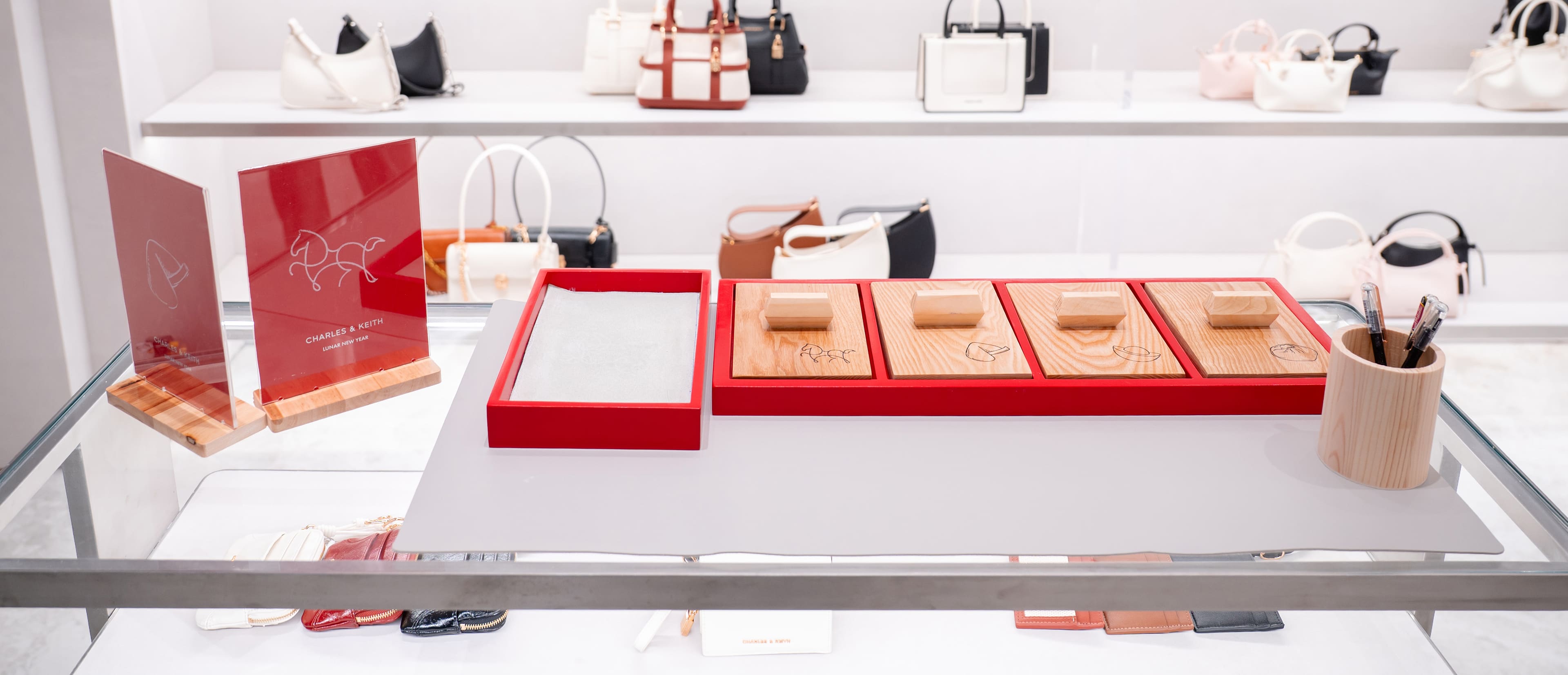 Lunar New Year greeting card stamping station at the CHARLES & KEITH store in Hanoi Centre - CHARLES & KEITH