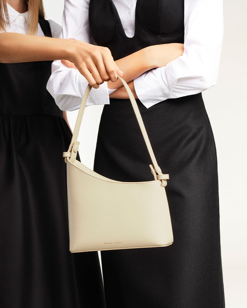 Women’s asymmetrical shoulder bag in chalk – CHARLES & KEITH