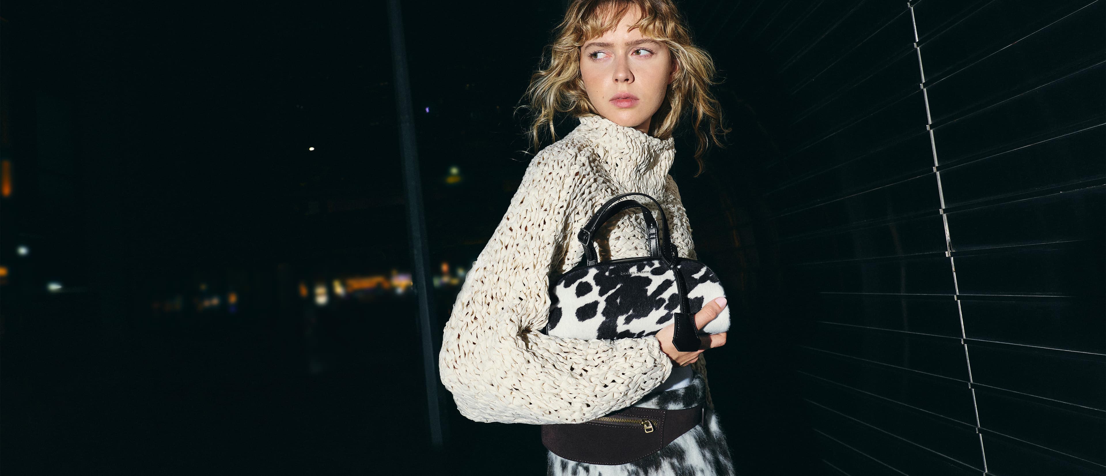 Vega Furry Cow-Print Elongated Bowling Bag - CHARLES & KEITH