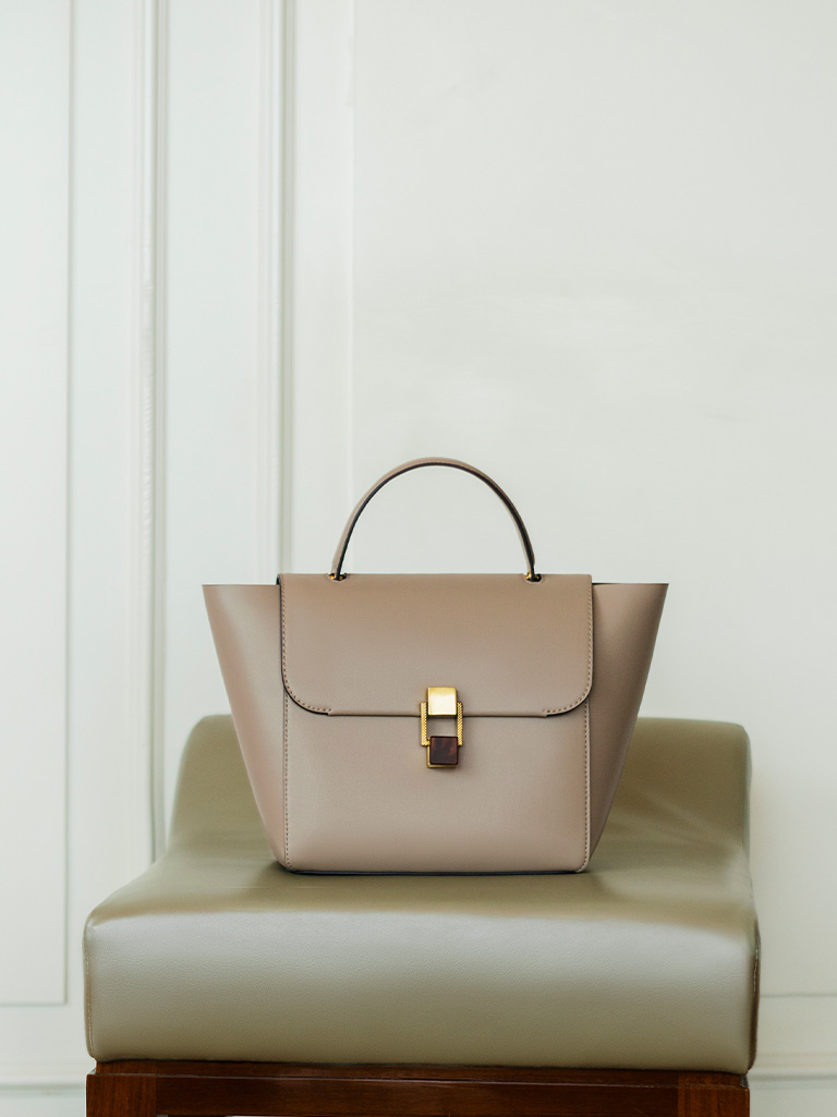 Women’s stone-embellished trapeze bag in taupe - CHARLES & KEITH