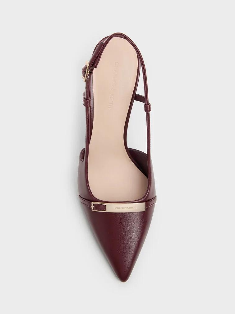 A pointed-toe silhouette features a narrow fit at the front.