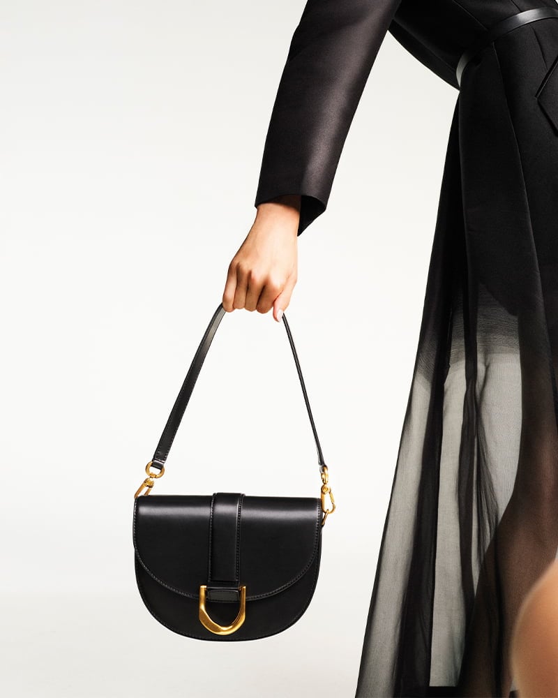 Women’s metallic buckle saddle bag in black – CHARLES & KEITH