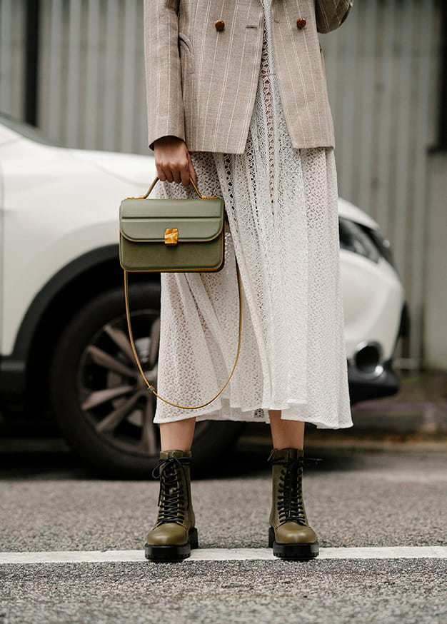 Women’s lace-up combat boots and textured hammered buckle bag (frontb view) – CHARLES & KEITH