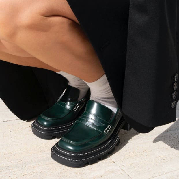 Women’s Perline chunky loafers in black, as seen on Sophia Ippoliti (side view) - CHARLES & KEITH