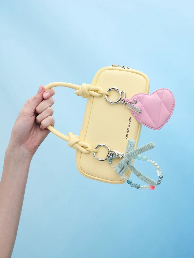 A mix-and-match combination of charms is perfect for maximalist dressers.