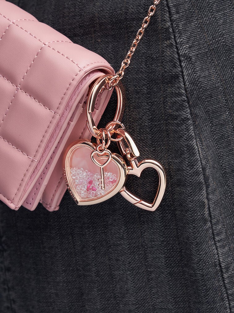 A heart-motif keychain instantly adds a romantic and girly touch 