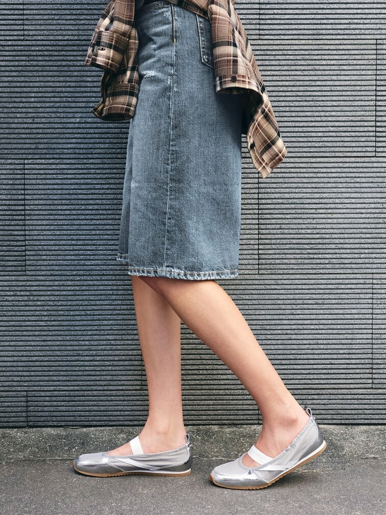 The relaxed silhouette of jorts complement well with slim Mary Jane sneakers