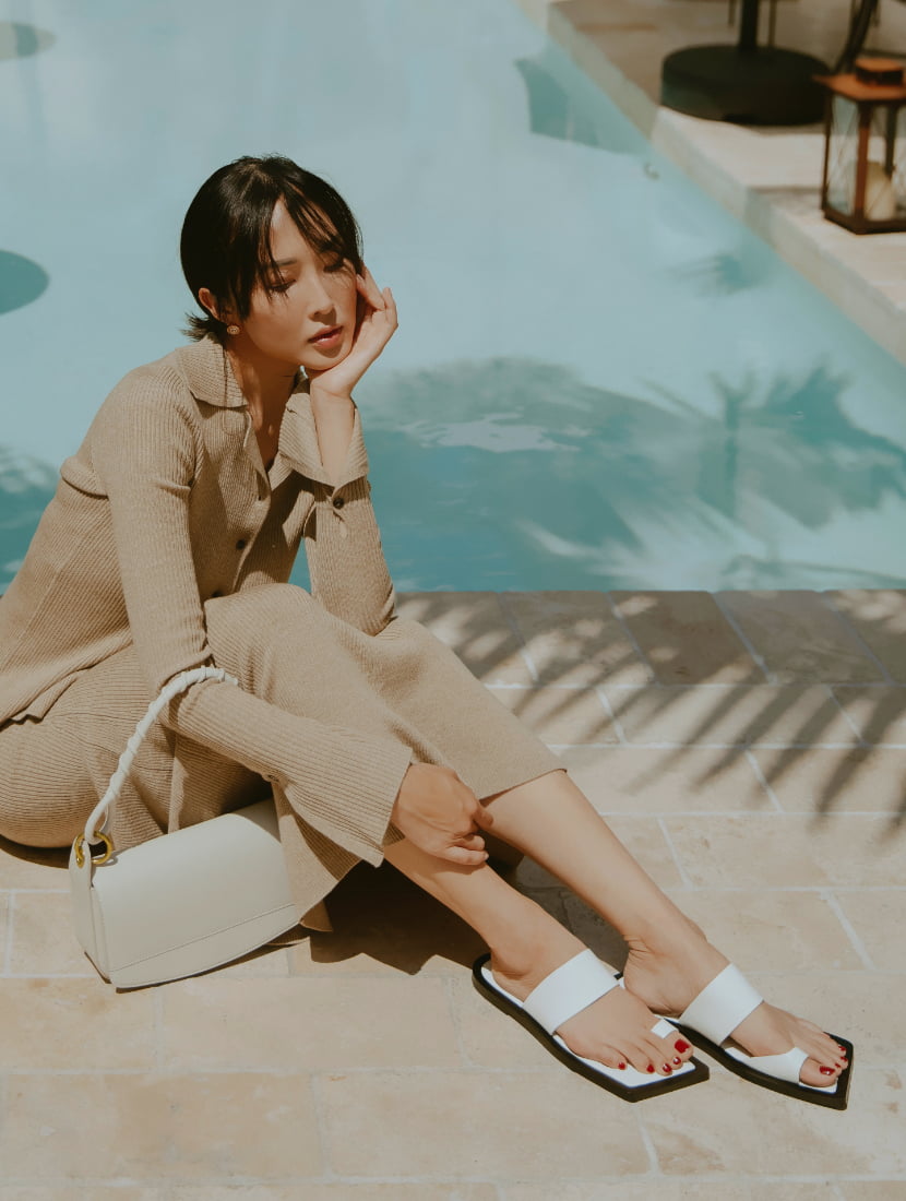 Women’s coiled top handle shoulder bag and toe loop slide sandals, as seen on Chriselle Lim - CHARLES & KEITH