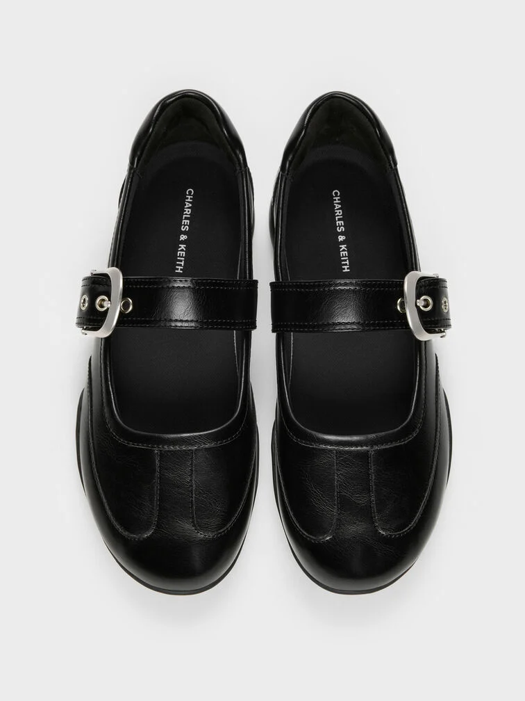 Black Mary Jane sneakers that are appropriate for work and smart-casual settings.