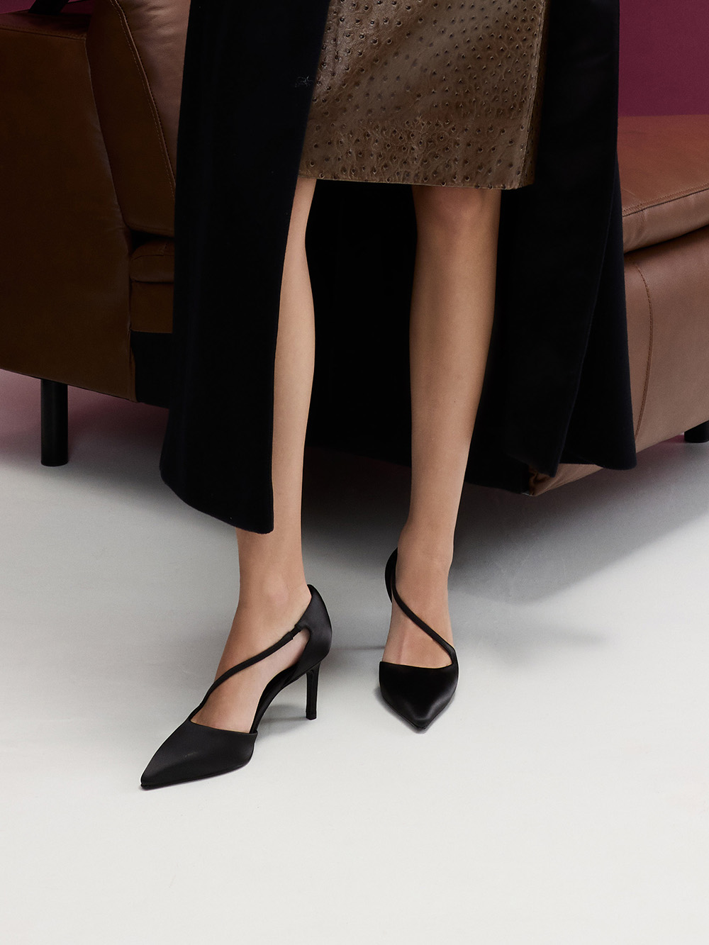 Women’s satin crystal-buckle block-heel slingback pumps in black (on model) - CHARLES & KEITH