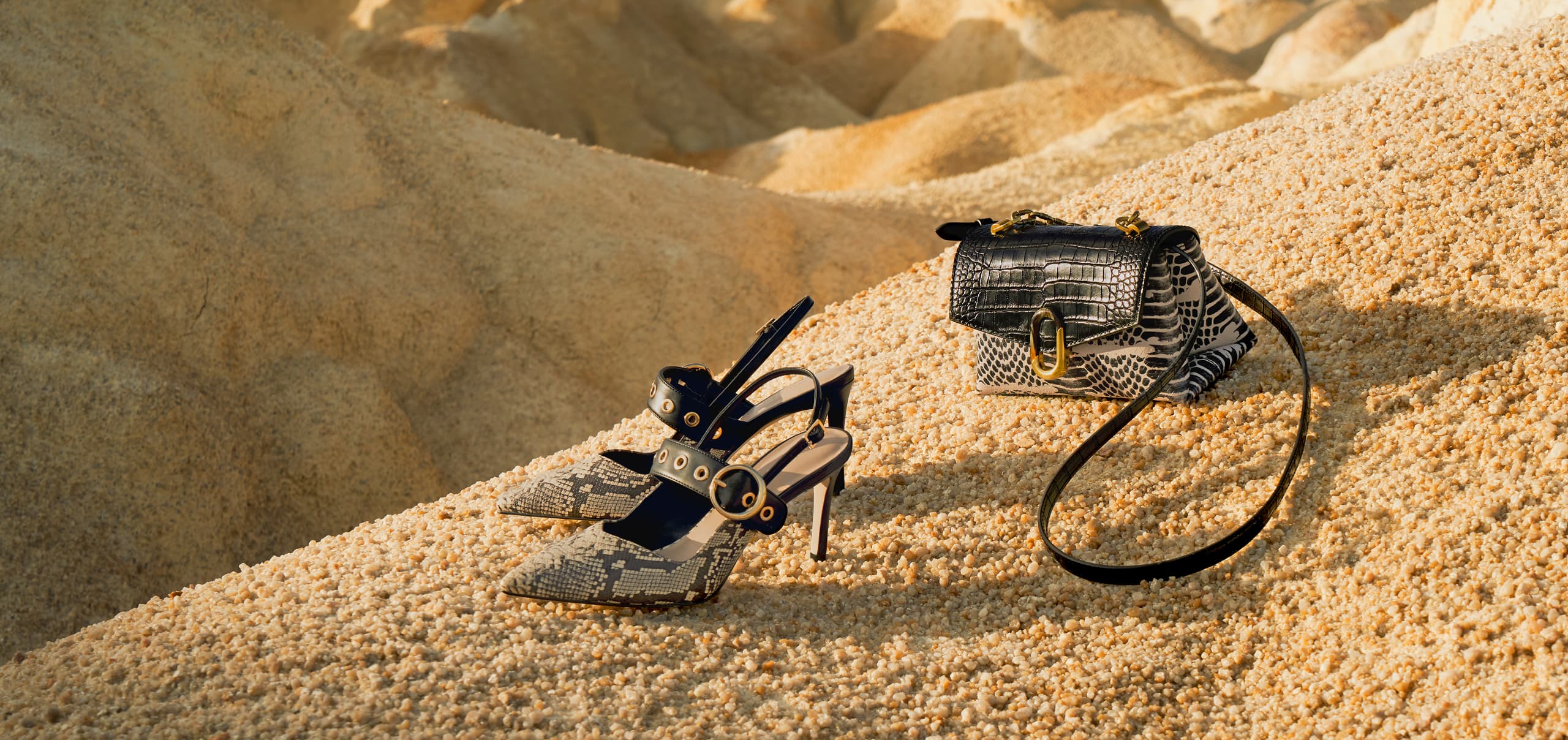 Women’s snakeskin print grommet slingback pumps and croc-effect chunky chain strap trapeze bag