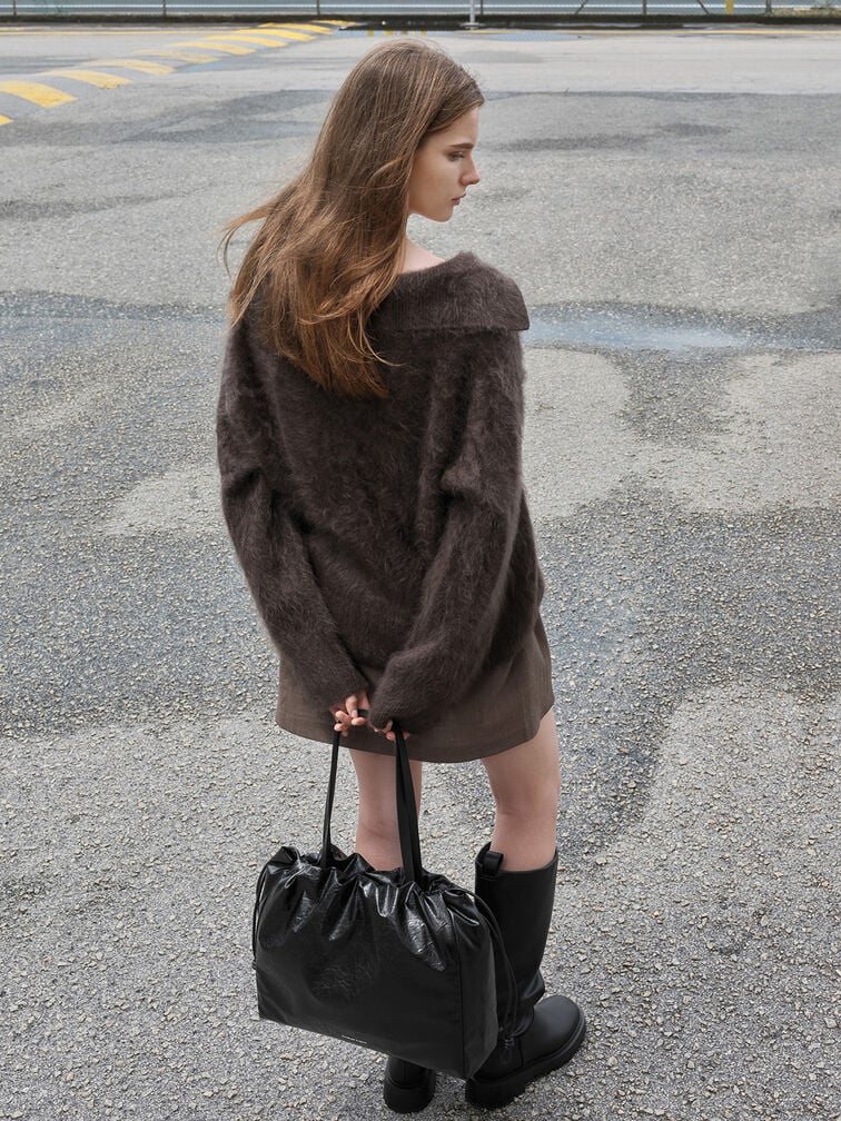 The spacious main compartment of the nylon puffy chain-link backpack – CHARLES & KEITH