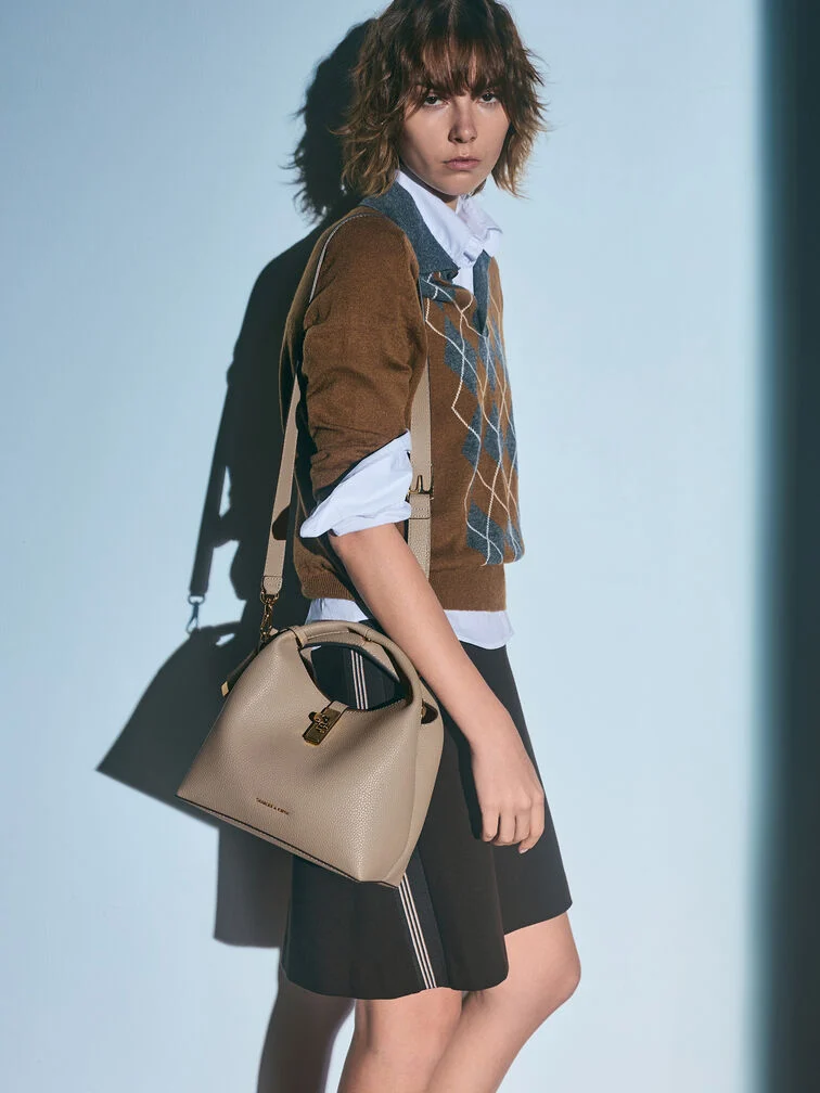 Women’s Chance turn-lock bag, one of CHARLES & KEITH’s best-selling work bags.