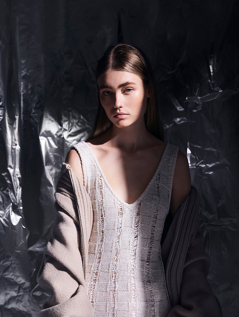 Banner for gloomy girl aesthetic featuring model in a zip-up outerwear and black gloves - CHARLES & KEITH