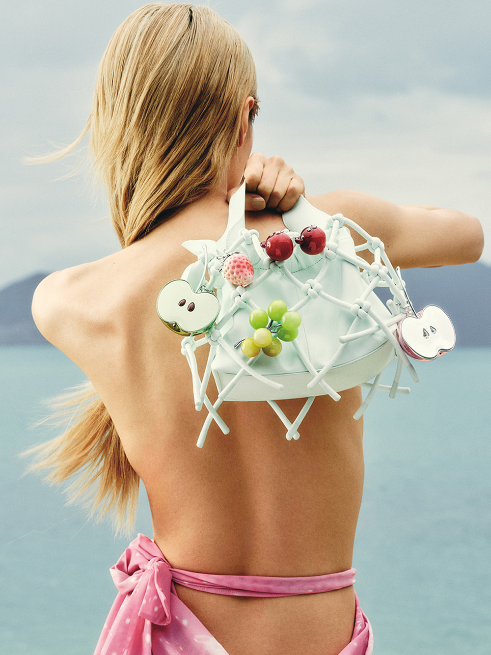 Women’s strappy tie-around sandals in mint sorbet, Ally ruched slouchy knotted bag in mint sorbet with green apple charm, strawberry charm, grape charm, cherry bear charm and metallic apple charm - CHARLES & KEITH