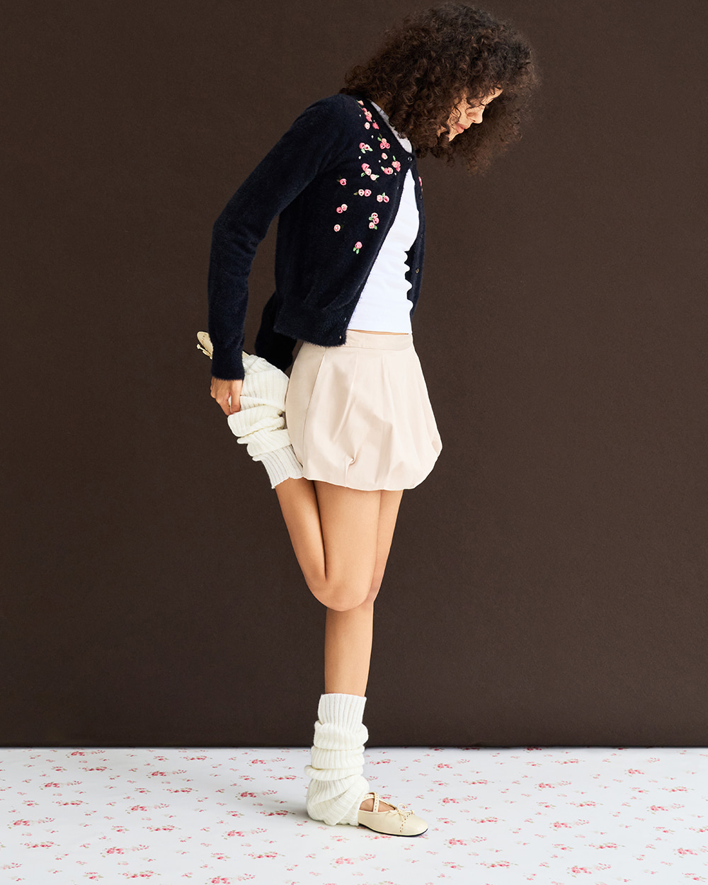 Women’s studded crossover-strap Mary Jane flats in chalk (on model) – CHARLES & KEITH