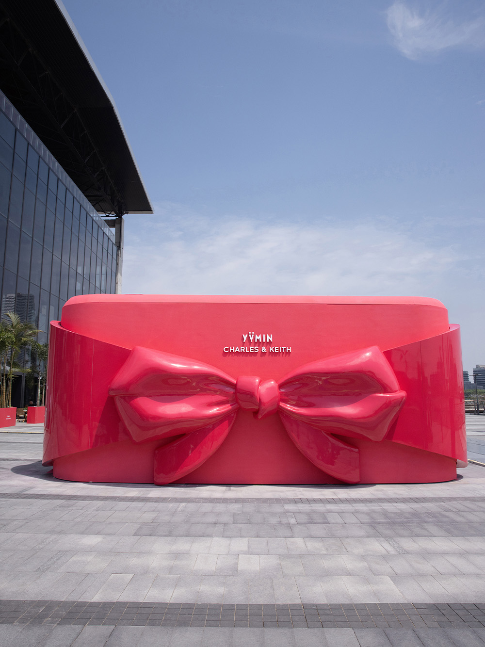 Giant bow on the front of the Shanghai pop-up — CHARLES & KEITH