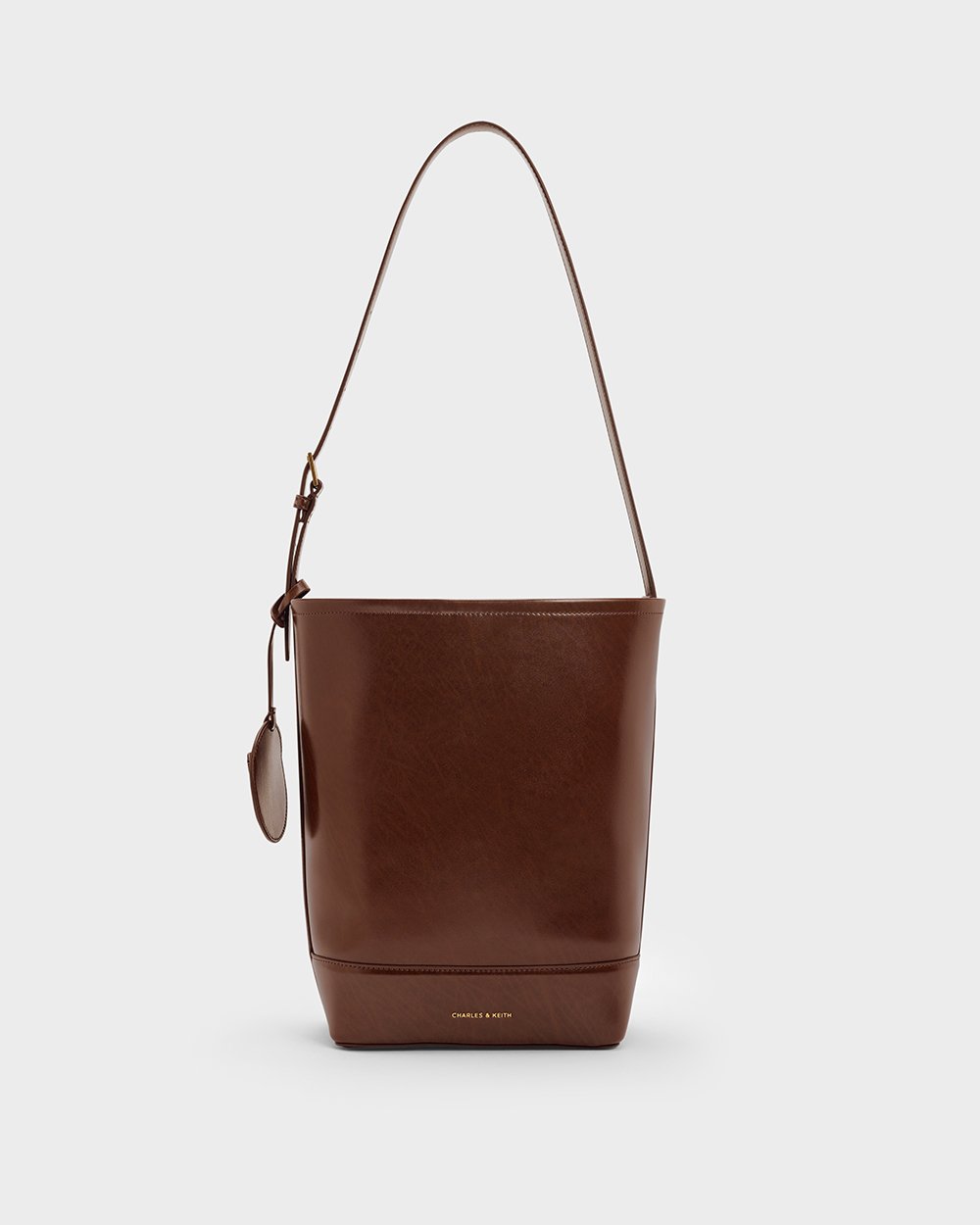 Women’s Enola Elongated Bucket Bag in dark brown - CHARLES & KEITH