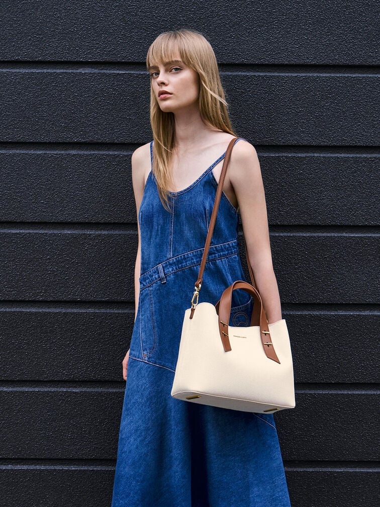 Keep your full-denim outfit simple and a statement bag be the hero piece of your look 