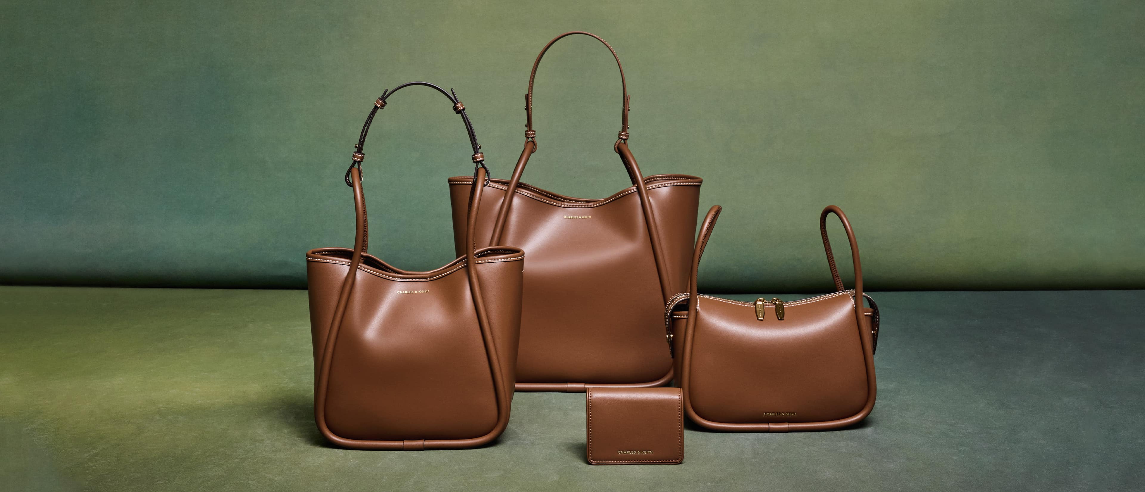 Women’s Lyla shoulder bag, mini Lyla tubular tote bag, Lyla knotted-strap wallet and Lyla tubular slouchy tote bag - CHARLES & KEITH