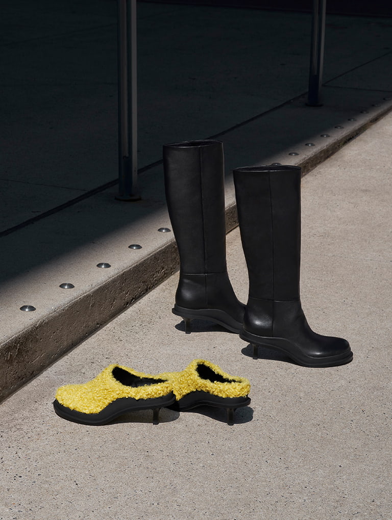 Frida Leather Knee-High Boots in black and Frida Furry Kitten Heel Mules in yellow - CHARLES & KEITH