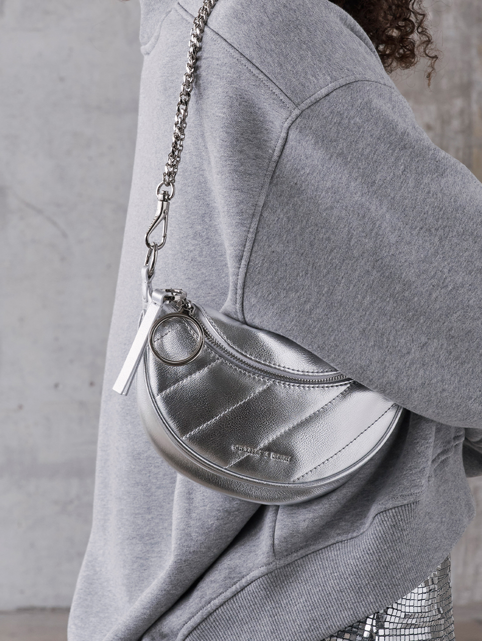 Women’s Philomena Crinkle-Effect Half-Moon Crossbody Bag; Charlot Metallic Chain Strap Bag; Philomena Crinkle-Effect Half-Moon Crossbody Bag; Avis Metallic Belted Ruched Shoulder Bag; Olivia Metallic Trapeze Shoulder Bag, all in silver - CHARLES & KEITH