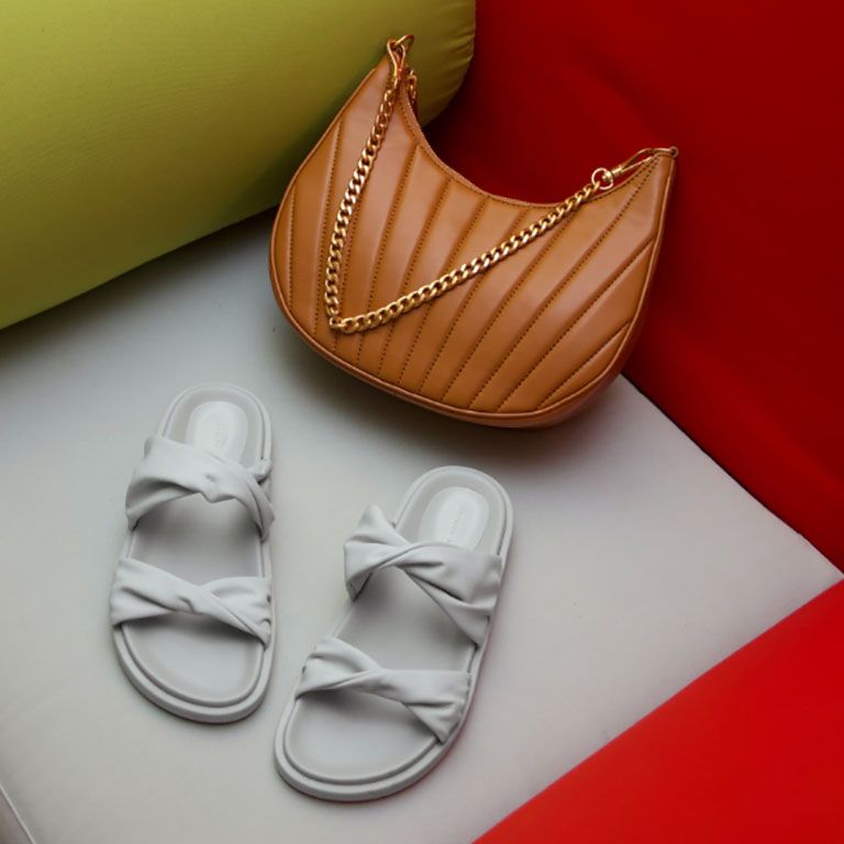 Women’s twist strap padded slide sandals and chain handle pleated moon bag, as seen on Marie Wibe Jedig - CHARLES & KEITH
