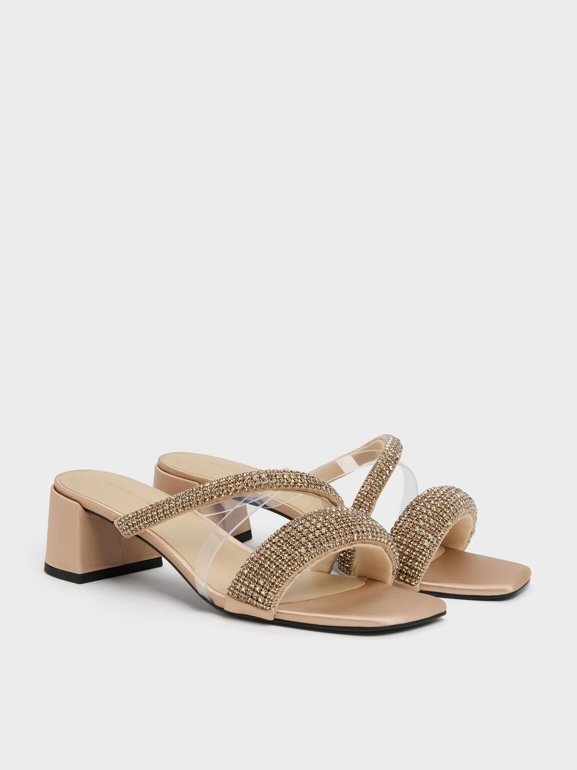 Block-heel sandals with crystal-embellished straps, great for holiday parties.
