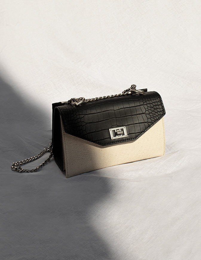 Women’s croc-effect turn-lock crossbody bag in black and white – CHARLES & KEITH