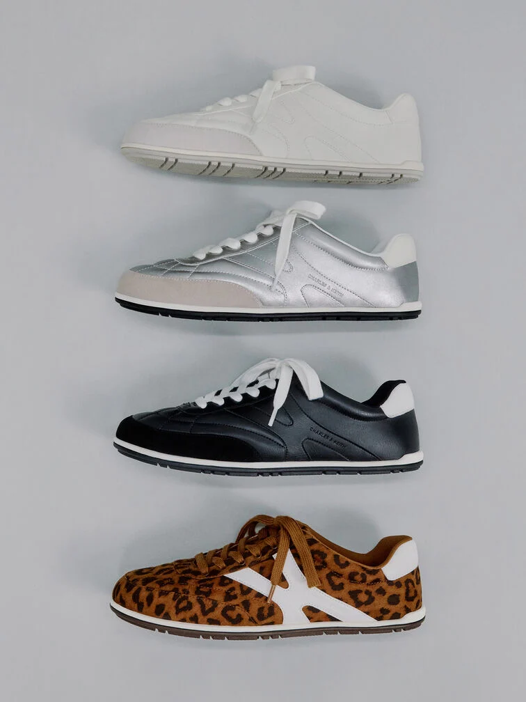  Low-top, flat-sole trainers are a comfortable choice for court sports.