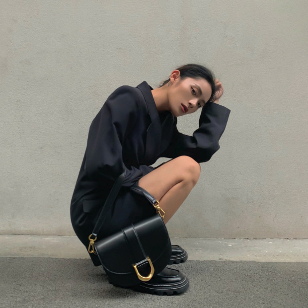 Women’s Perline chunky loafers and Gabine saddle bag in black, as seen on Michella Choi - CHARLES & KEITH