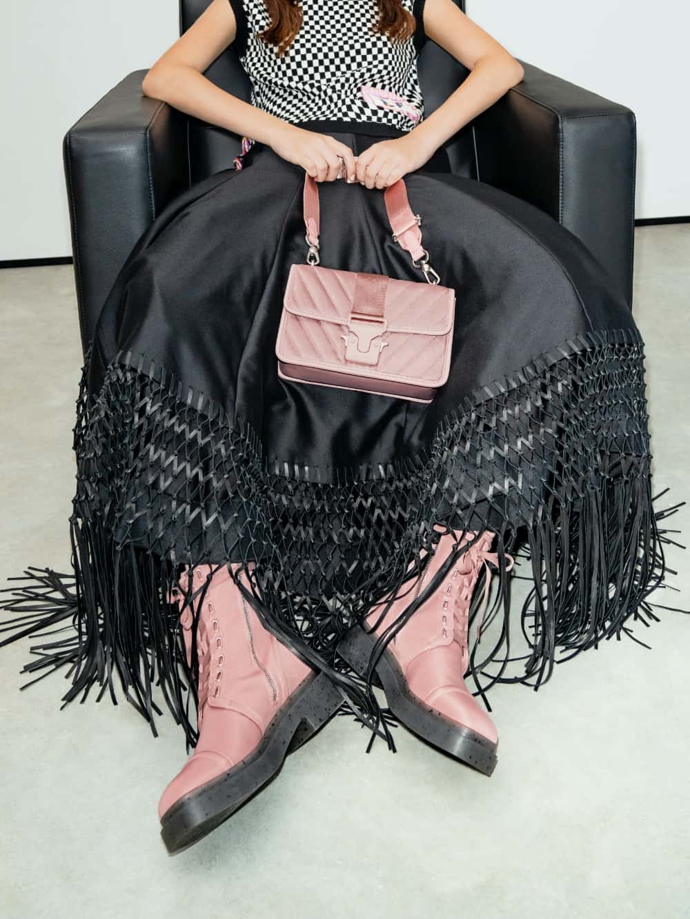 Women's pink Charli recycled nylon lace-up ankle boots and pink Sonia recycled nylon padded bag from the Anniversary Series - CHARLES & KEITH