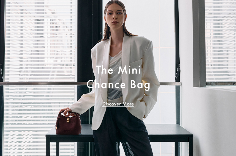Wineberry red mini Chance Turn-Lock Bucket Bag - CHARLES & KEITH