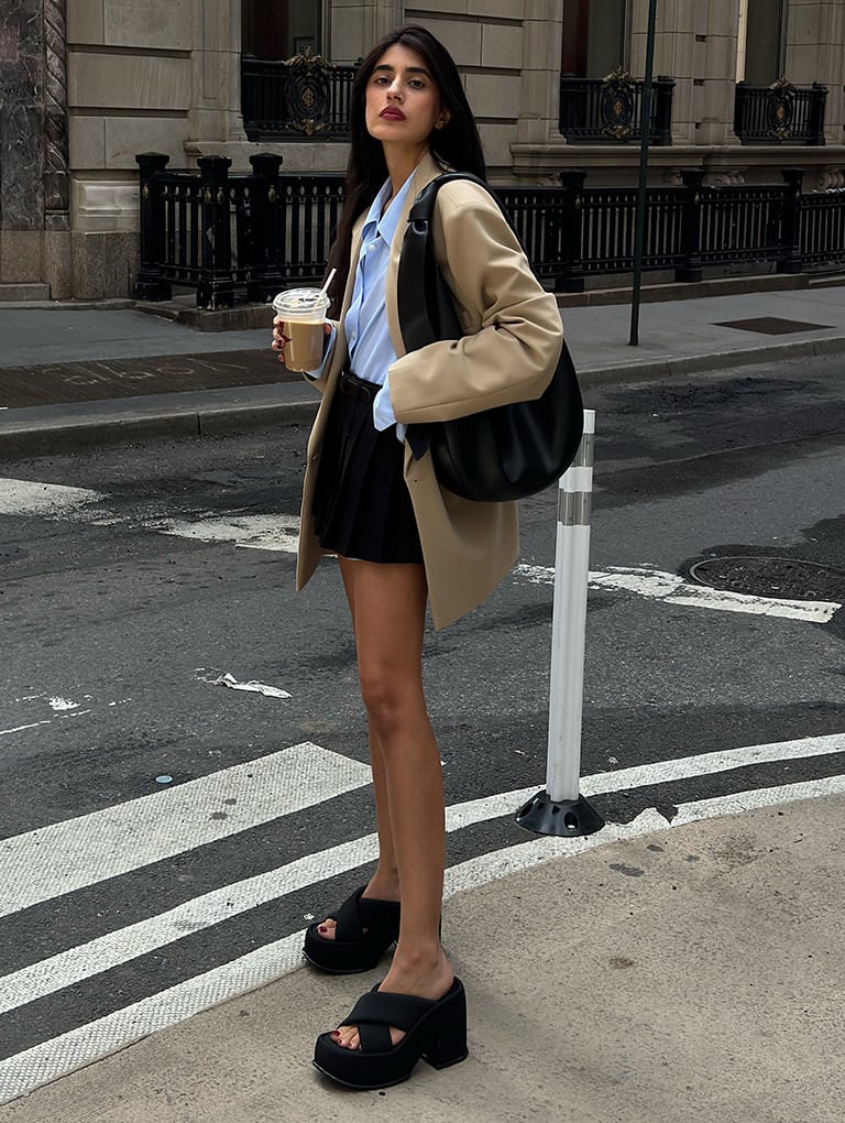 Women’s Toni Knotted Curved Hobo Bag in noir black, as seen on Natasha Narrina - CHARLES & KEITH