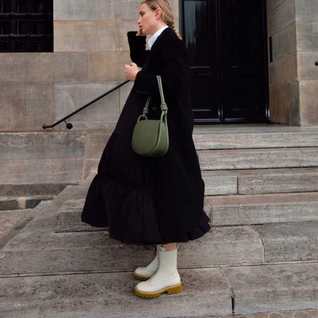 Women’s Luna knotted handle shoulder bag and Billie front-zip ankle boots, as seen on Rebecca Laurey – CHARLES & KEITH