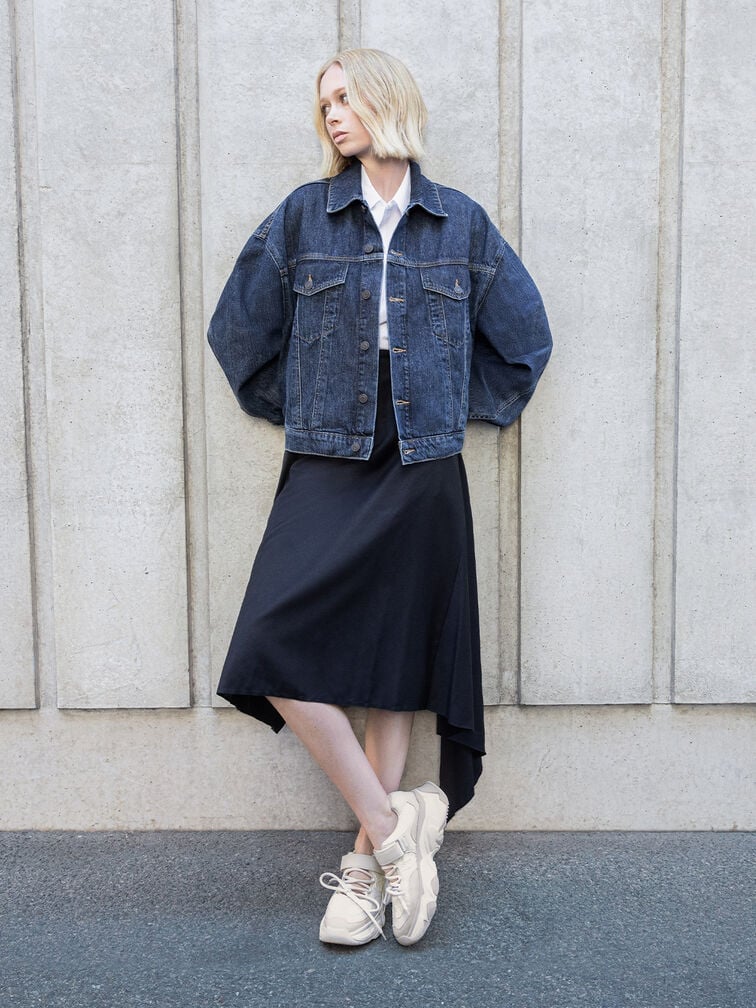 White trainers paired with a structured denim jacket, a white button-up shirt, and a black draped skirt - CHARLES & KEITH